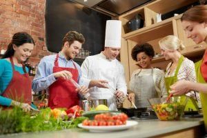 happy-friends-chef-cook-cooking-kitchen-class-culinary-food-people-concept-group-male-52227820-cooking 3